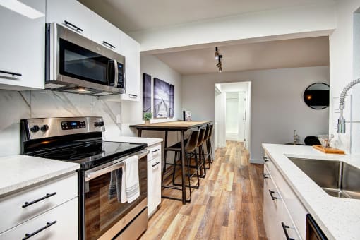 Kitchen with High Table and Chairs at Woodlake Apartments, Kirkland 98034