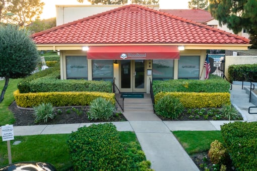 Leasing office entrance at Woodbend, Alta Loma