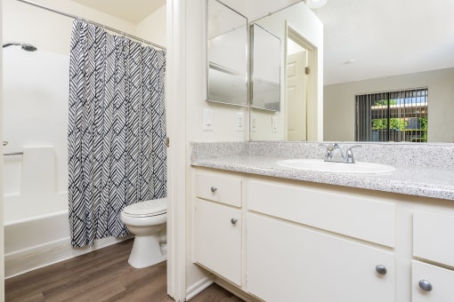 Sink, bathroom and shower at Woodbend, Alta Loma, CA, 91701
