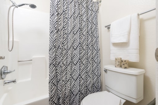 Bathroom with shower and toilet at Woodbend, Alta Loma, CA, 91701