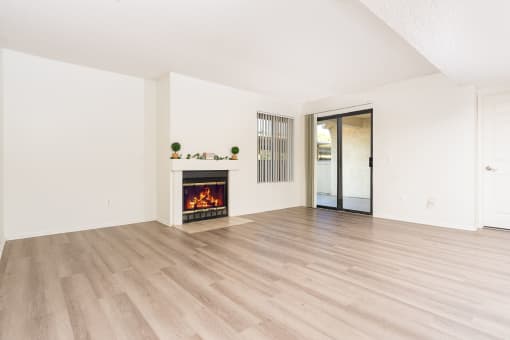 Living Room with Fireplace and High Ceilings at Woodbend, Alta Loma, CA, 91701