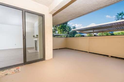 Large balcony with sliding door to unit at Woodbend, California, 91701