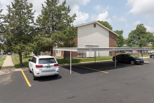 a parking lot with a car parked in front of a building