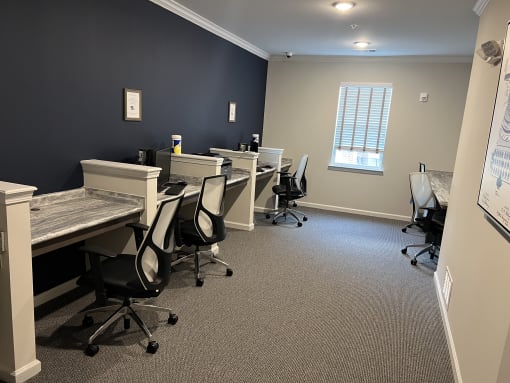 an office with desks and chairs