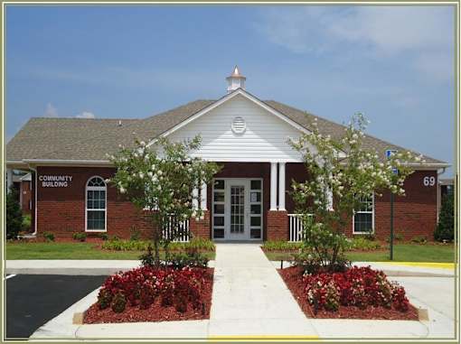 A building with a sign that says Community Building.