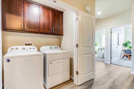 A laundry room with a washer and dryer.