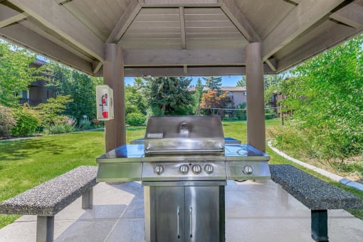 a gas grill is available in the back patio of the home