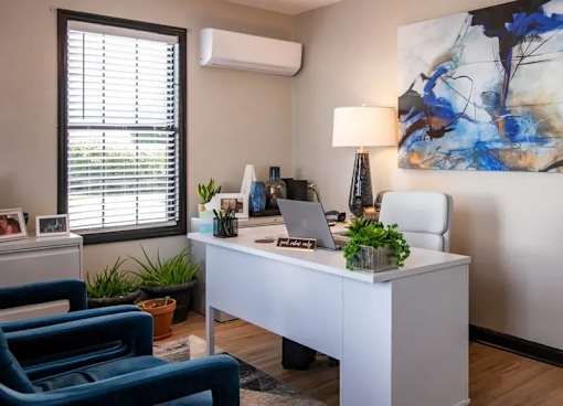 an office with a desk and a laptop on it at Cleo Apartments, Athens, 35611