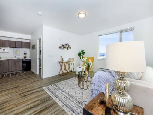 a living room with a couch and a table at Jefferson Yards, Washington, 98402