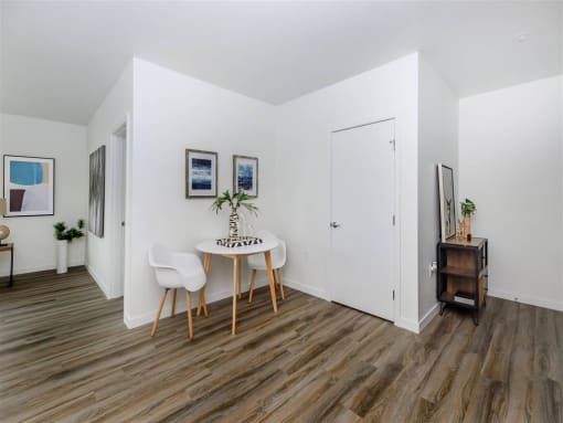 a dining room with a table and chairs at Jefferson Yards, Tacoma, WA 98402