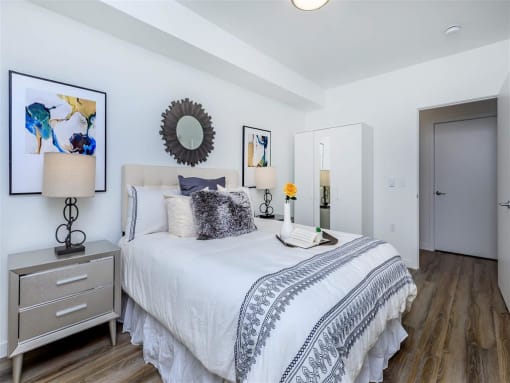 a bedroom with a bed and two night stands at Jefferson Yards, Tacoma Washington