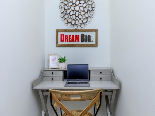 a desk with a laptop and a chair in a room at Jefferson Yards, Tacoma, WA 98402