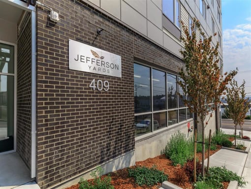 a brick building with a sign that says jefferson yards at Jefferson Yards, Washington