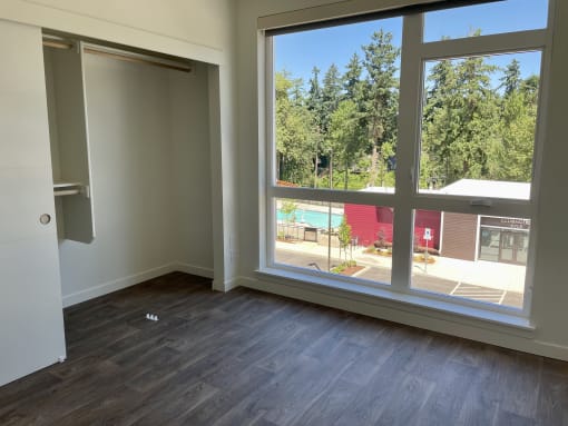 Living Area With Balcony at Commons on the Tualatin River, Tualatin, OR, 97062