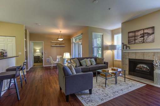 Living Area With Fireplace at Commons at Verandas in Tanasbourne Apartments, Oregon