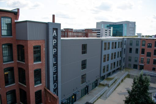 an aerial view of a building with a sign on it