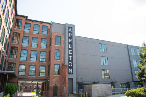 a large building with a sign on the side of it