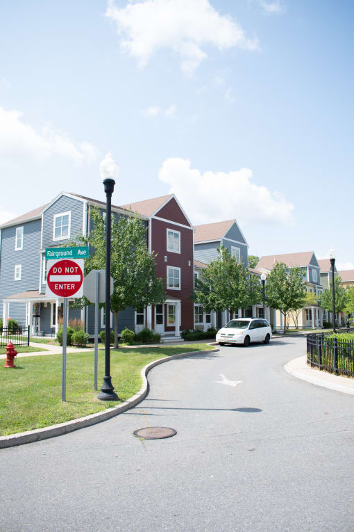 a do not enter sign in front of an apartment complex