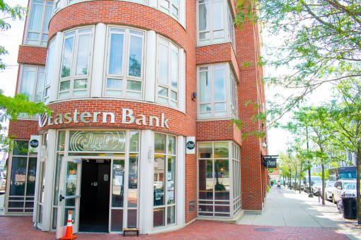 a large brick building with a sign that reads western bank