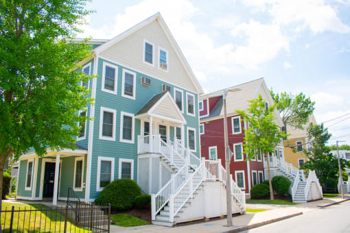 a row of colorful houses on a street