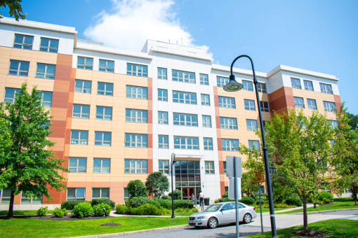 a large building with a car parked in front of it