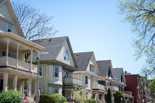a row of houses on a city street