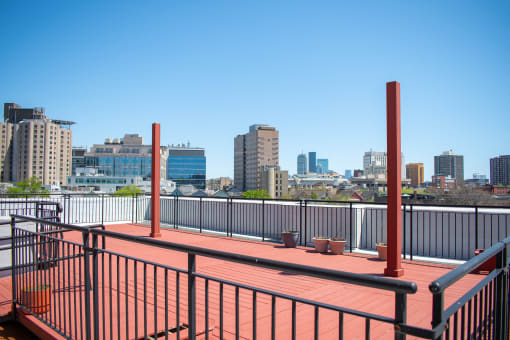 the deck on the top of the building has a view of the city