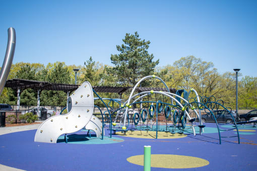 a playground at a park with a slide