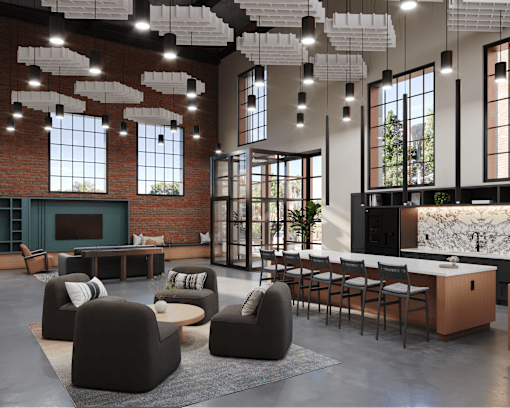 A modern living room with a fireplace and a kitchen area in the background.