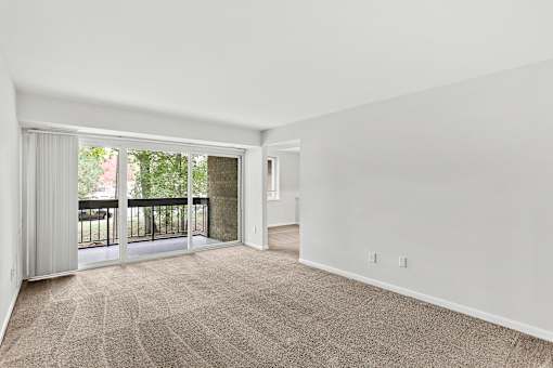 living room and a walk out private balcony
