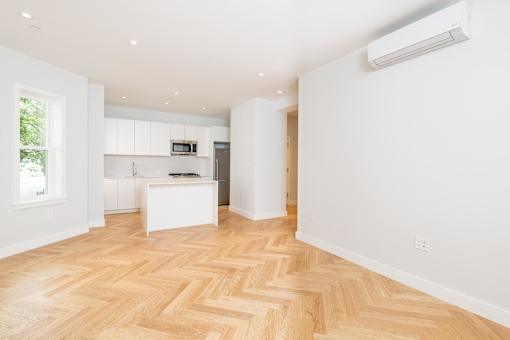 renovated apartment living room and kitchen
