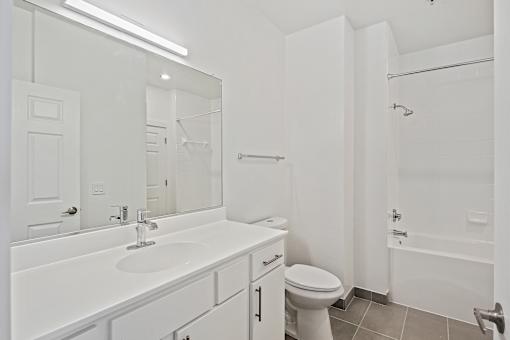 renovated bathroom with DalTile flooring