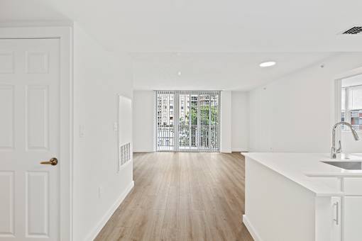 renovated unit with Kaindl flooring throughout