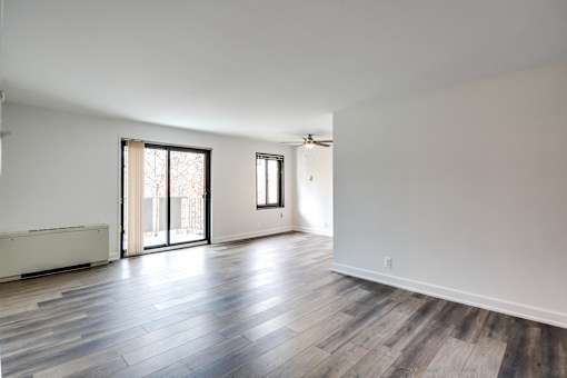 living room with sliding glass door to the balcony