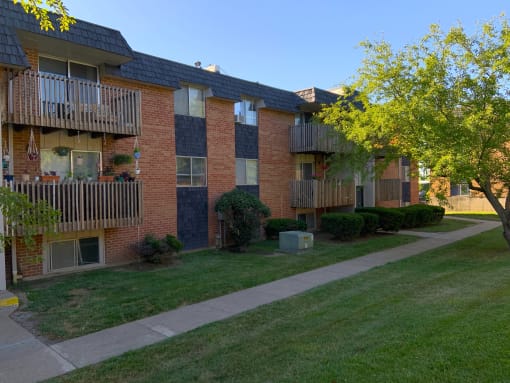 The exterior of brick and balcony at Lexington Square in Independence, MO