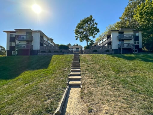 a row of steps leading up to an apartment building