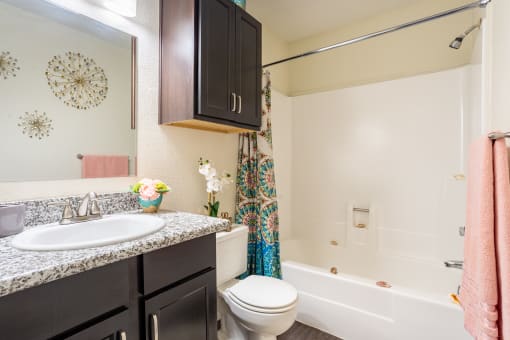 Bathroom with bathtub and vanity  at Bennett Ridge Apartments, Oklahoma