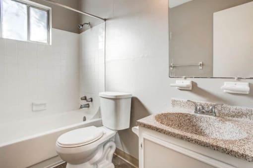 Bathroom with full shower and vanity