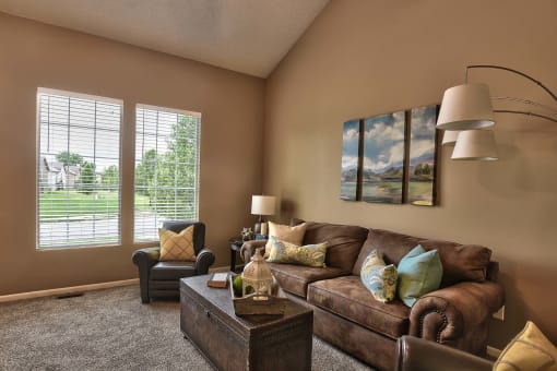 a living room with a couch and a table