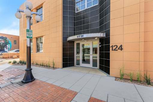 A building with a sign that says 124 on it.