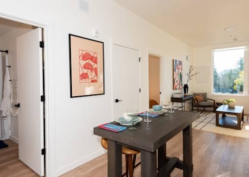 Arts Plaza Gresham Oregon Apartments A dining room with a table set for two.
