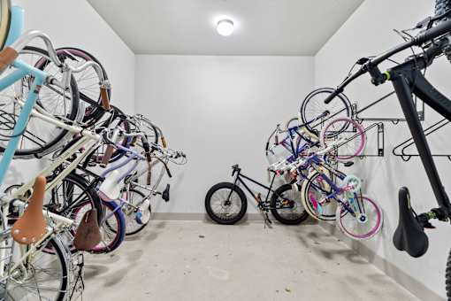 A room full of bicycles of various types and sizes.