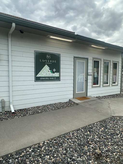 A white building with a Laverde sign on the front.