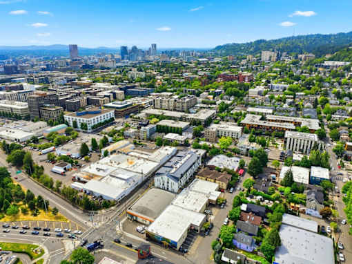 A cityscape with buildings and roads.