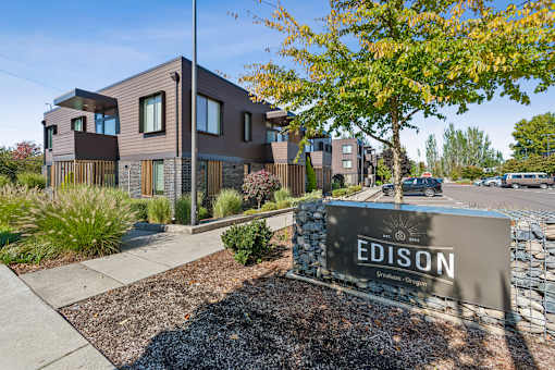 A modern building with the name "EDISON" on a sign in front of it.