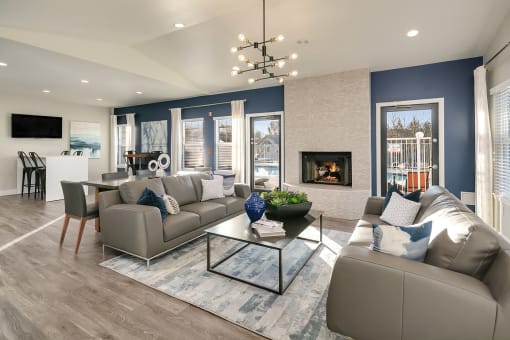 Atlas Apartments Clubhouse Seating Area and Fireplace