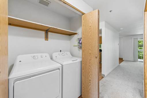 A laundry room with a washer and dryer.