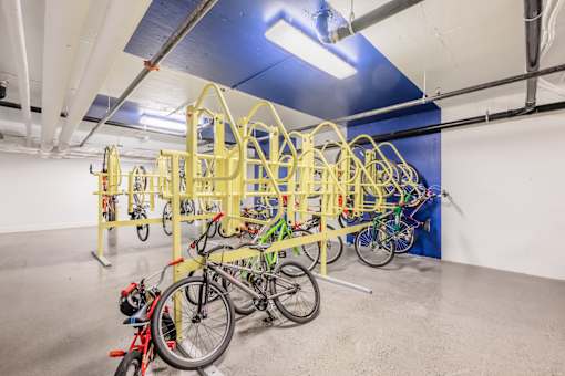 A bike rack with many bikes on it.