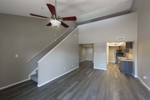 a living room with a ceiling fan