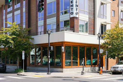 A building with a sign that says "ENTO" on it.